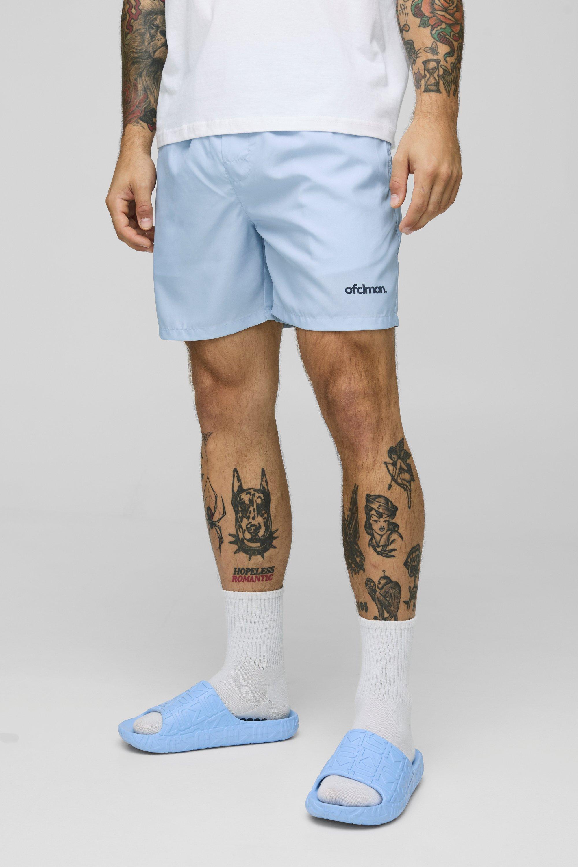 Mens Blue Mid Length Official Man Branded Swim Shorts, Blue